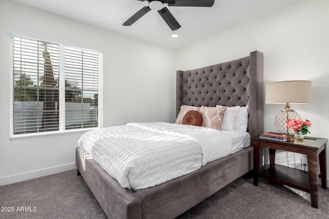 bedroom with ceiling fan and carpet flooring