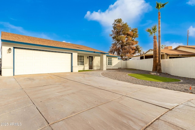 ranch-style home with a garage