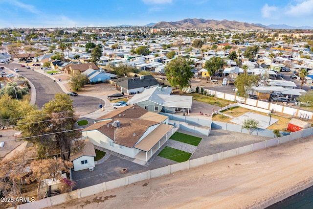 birds eye view of property featuring a mountain view