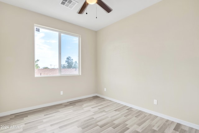 unfurnished room featuring ceiling fan and light hardwood / wood-style flooring