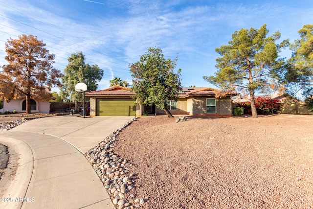 ranch-style house featuring a garage