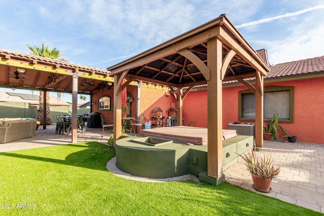 exterior space with a bar, area for grilling, ceiling fan, an outdoor living space, and a gazebo