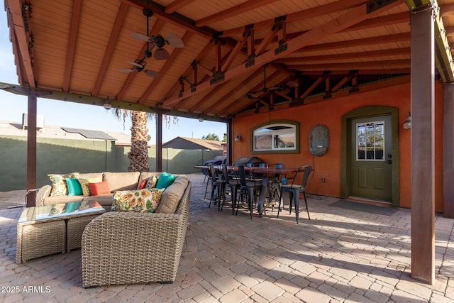 view of patio / terrace with a gazebo, an outdoor hangout area, and ceiling fan