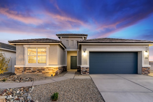 prairie-style home with a garage