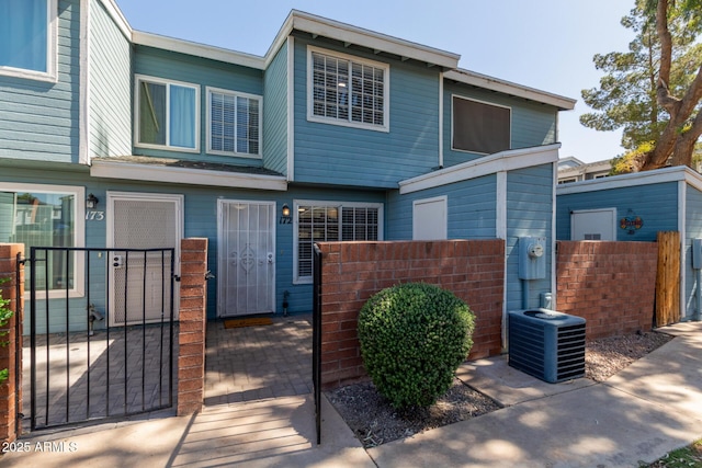 2301 E University Dr Unit 172, Mesa, AZ 85213 - view of property with a gate and central AC