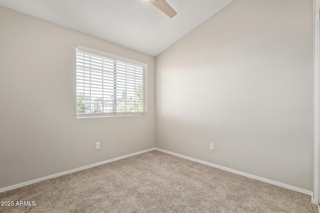 2301 E University Dr Unit 172, Mesa, AZ 85213 - carpeted empty room featuring lofted ceiling and baseboards