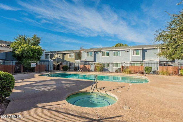 2301 E University Dr Unit 172, Mesa, AZ 85213 - community pool featuring a hot tub, a patio, and a residential view
