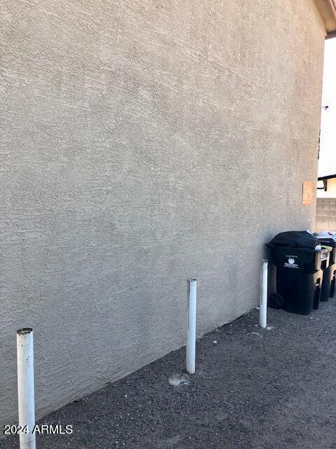 exterior details featuring stucco siding