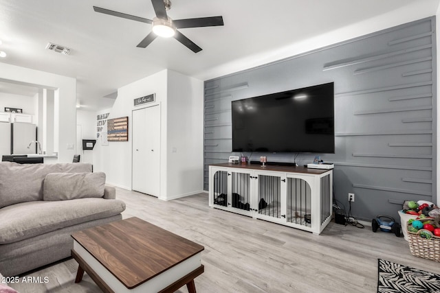 1961 N Hartford St Unit 1092, Chandler, AZ 85225 - living room with wood finished floors and a ceiling fan