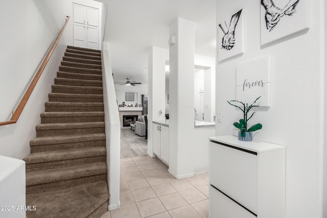 1961 N Hartford St Unit 1092, Chandler, AZ 85225 - stairway with a fireplace, tile patterned flooring, and ceiling fan