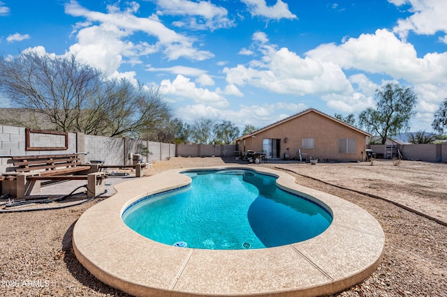 view of pool featuring a patio, a fenced backyard, and a fenced in pool