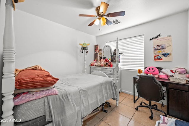 bedroom featuring light tile patterned floors, ceiling fan, and visible vents