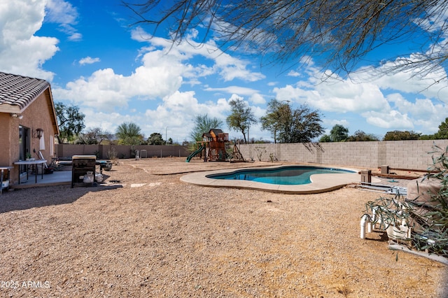 view of swimming pool featuring a patio area, a fenced backyard, and a fenced in pool