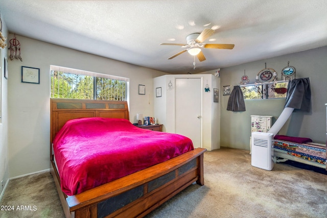 1987 Stagg Run, Overgaard, AZ 85933 - bedroom with ceiling fan, carpet floors, and a textured ceiling