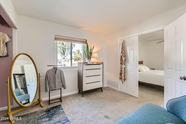 bedroom featuring light colored carpet