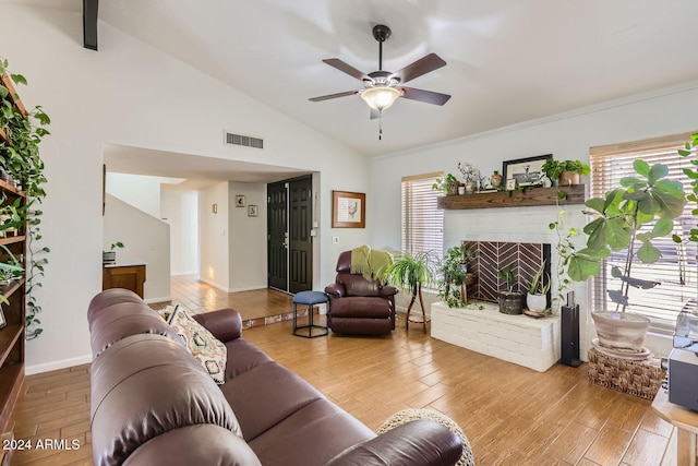 living room with light wood-type flooring and plenty of natural light