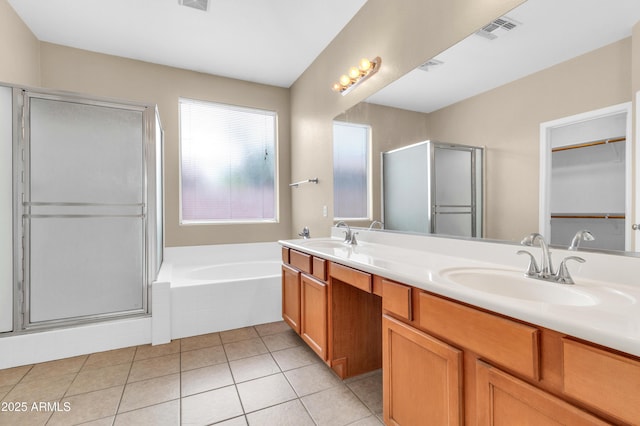 1422 E Ebony Dr, Chandler, AZ 85286 - bathroom featuring a bath, a stall shower, a sink, and visible vents