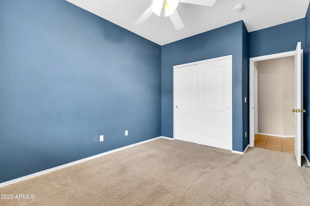 1422 E Ebony Dr, Chandler, AZ 85286 - unfurnished bedroom featuring carpet, a closet, baseboards, and a ceiling fan