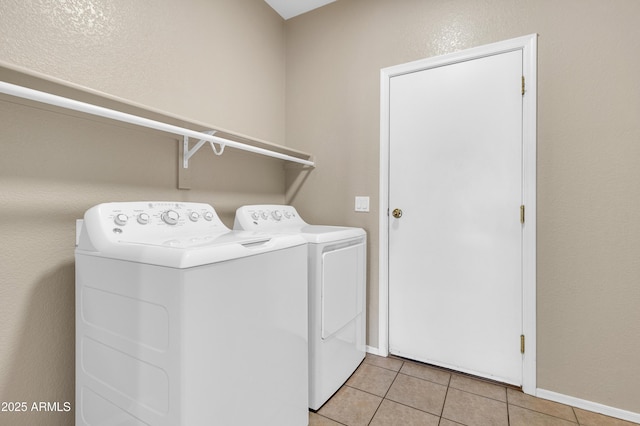 1422 E Ebony Dr, Chandler, AZ 85286 - clothes washing area featuring independent washer and dryer, laundry area, baseboards, and light tile patterned flooring