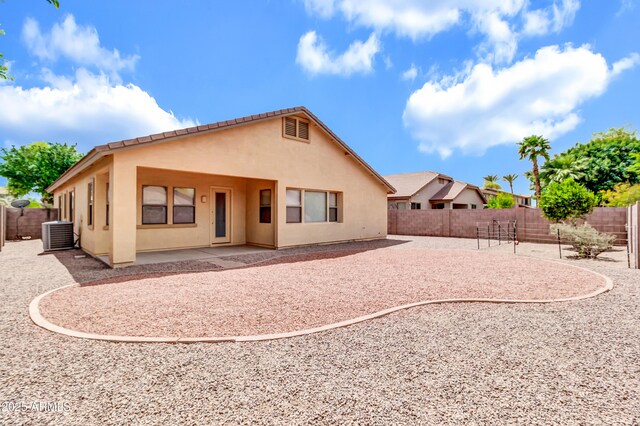 1422 E Ebony Dr, Chandler, AZ 85286 - rear view of property featuring cooling unit, a patio, a fenced backyard, and stucco siding