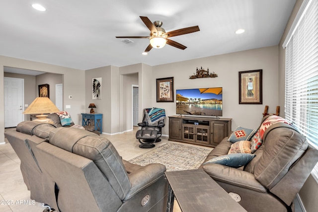 living area featuring visible vents, baseboards, ceiling fan, recessed lighting, and light tile patterned floors