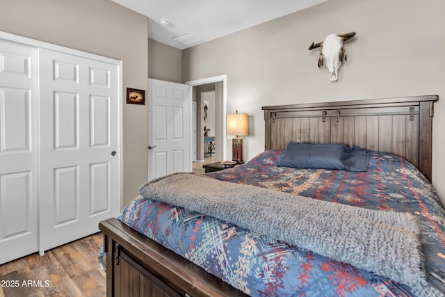 bedroom with wood finished floors