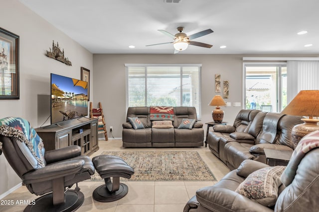living room with baseboards, tile patterned floors, recessed lighting, and a ceiling fan
