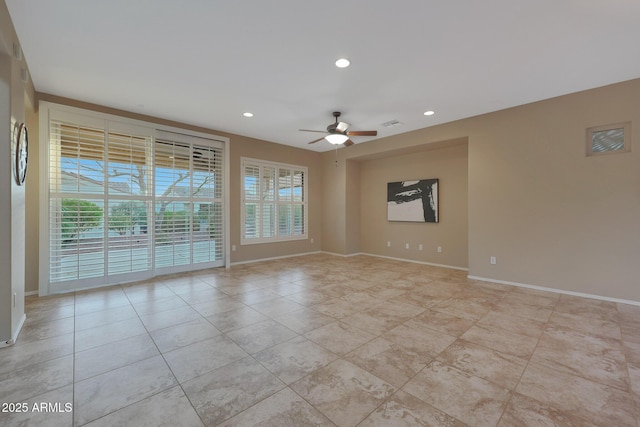 spare room featuring ceiling fan