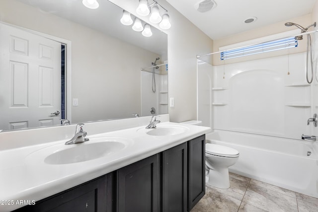 full bathroom with shower / bathing tub combination, vanity, tile patterned floors, and toilet