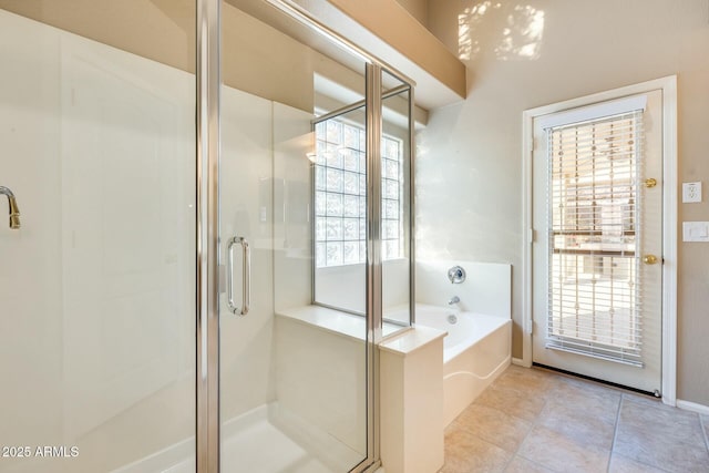 bathroom with tile patterned flooring and plus walk in shower