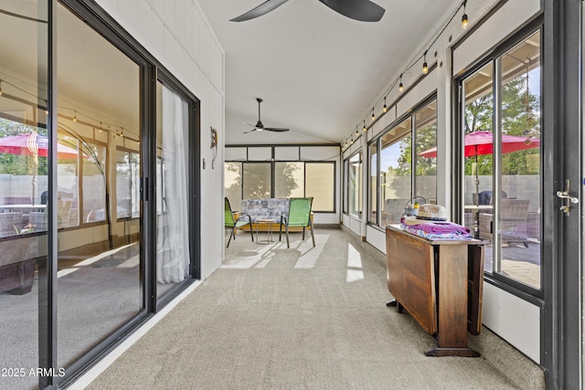 sunroom with plenty of natural light and ceiling fan