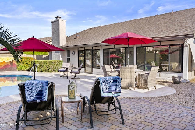 view of patio featuring an outdoor pool