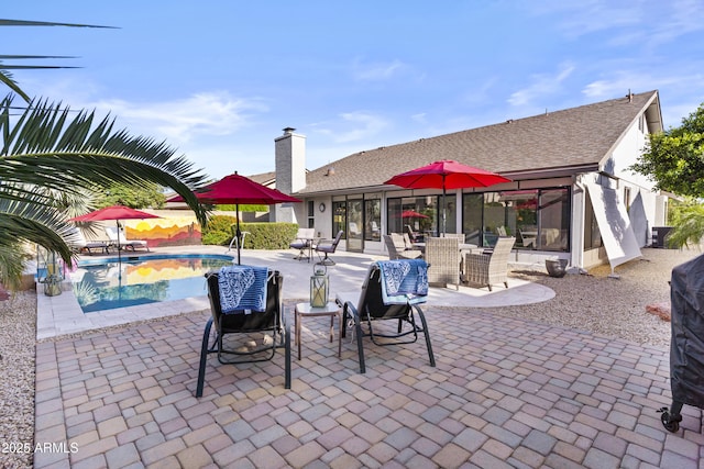 view of patio / terrace featuring an outdoor pool