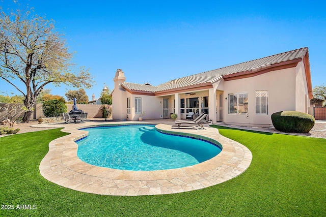 exterior space featuring a fenced backyard, ceiling fan, a patio, and stucco siding