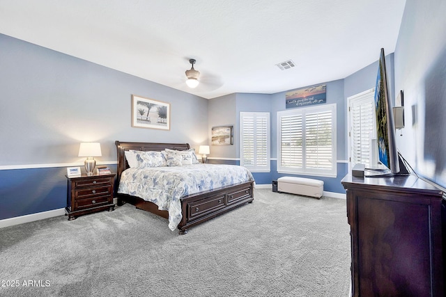 bedroom with ceiling fan, carpet, visible vents, and baseboards