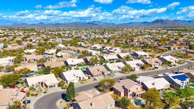 bird's eye view with a residential view and a mountain view