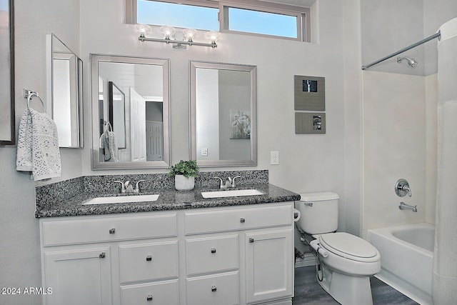 full bathroom featuring vanity, toilet, wood-type flooring, and bathtub / shower combination