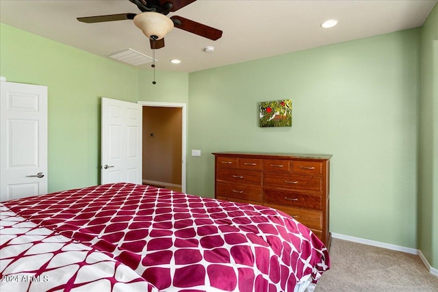 unfurnished bedroom featuring carpet and ceiling fan