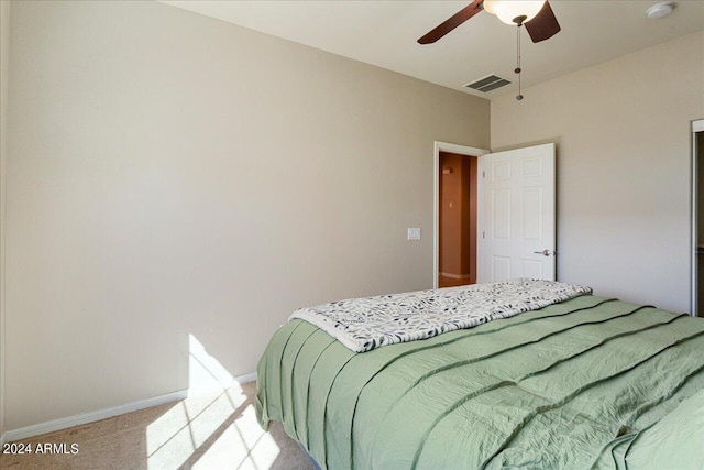 bedroom featuring ceiling fan and light colored carpet