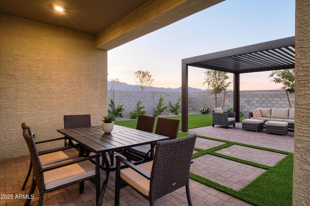 19022 W Rose Ln, Waddell, AZ 85355 - view of patio with a fenced backyard, outdoor dining area, outdoor lounge area, and a pergola