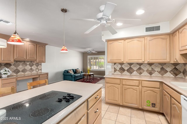 8538 E Vista Dr, Scottsdale, AZ 85250 - kitchen featuring black electric stovetop, light brown cabinets, ceiling fan, backsplash, and light countertops