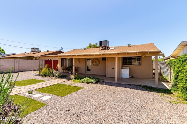 8538 E Vista Dr, Scottsdale, AZ 85250 - rear view of property with washer / dryer, a patio, a fenced backyard, and stucco siding