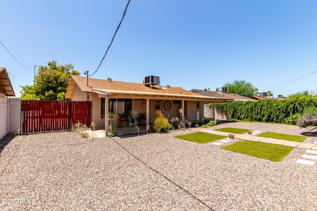 8538 E Vista Dr, Scottsdale, AZ 85250 - rear view of house featuring a patio and a gate