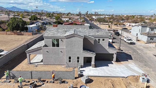 birds eye view of property featuring a residential view and a mountain view