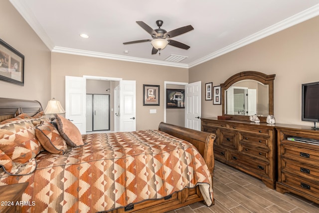 bedroom featuring hardwood / wood-style flooring, ceiling fan, and crown molding