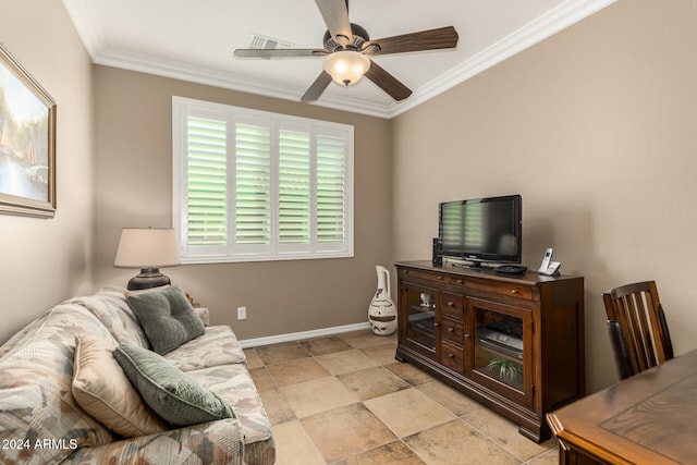 living room featuring ceiling fan and ornamental molding