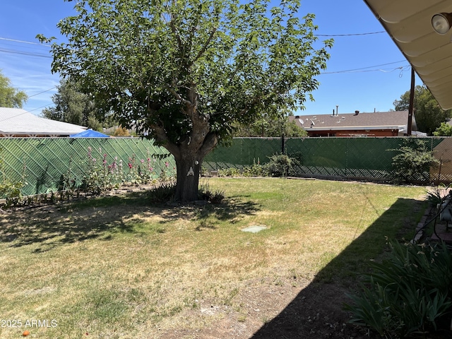 view of yard with fence