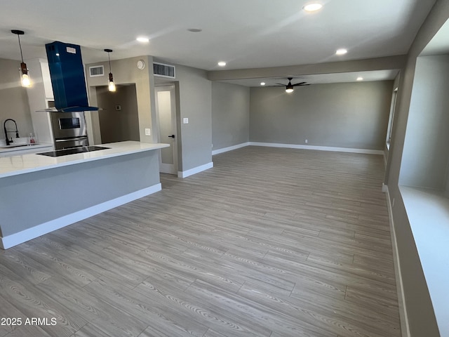 kitchen with visible vents, ceiling fan, recessed lighting, white cabinets, and light wood-style flooring