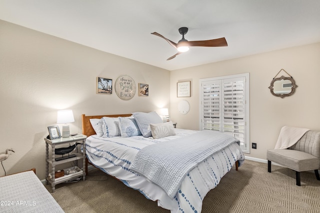 10658 E Cinnabar Ave, Scottsdale, AZ 85258 - carpeted bedroom with baseboards and a ceiling fan