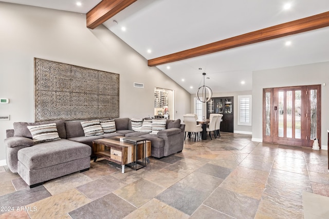 10658 E Cinnabar Ave, Scottsdale, AZ 85258 - living area with recessed lighting, baseboards, vaulted ceiling with beams, and stone tile flooring